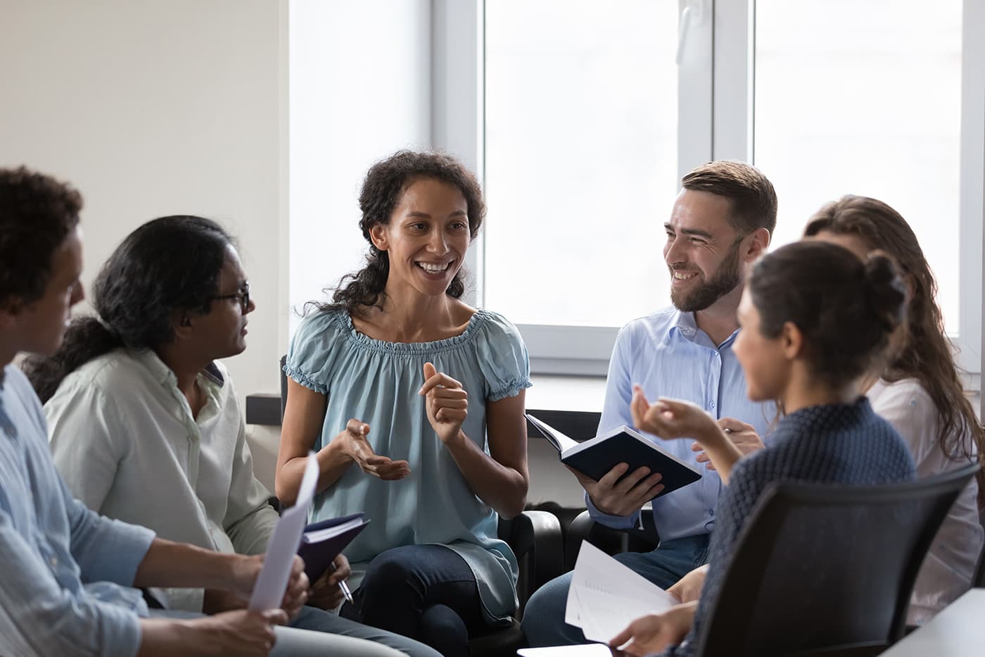 diverse-group-of-people-in-discussion-session